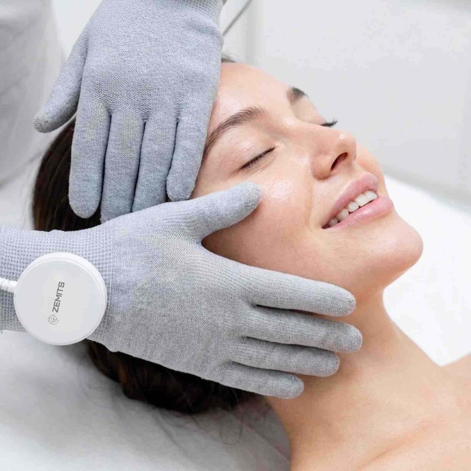 Zemits professional microcurrent facial — conductive gloves during treatment